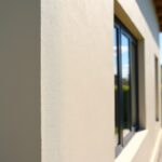 Enduit gratté : méthodes, coût et astuces pour une façade impeccable